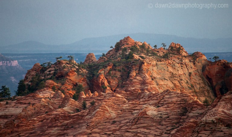 Colorful sandstone rock formations formed through erosion are seen atCave Valley at the Kolob Terrace section of Zion National Park, Utah