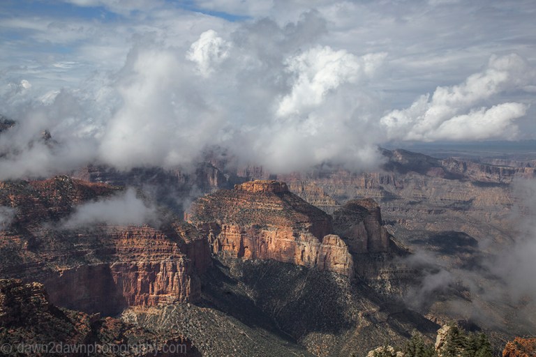Fog rises from the depths of the Grand Canyon near Cape Royal at Grand Canyon National Park, Arizona