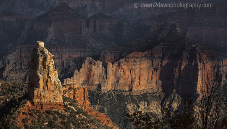The settting sun forms shadows on the Grand Canyon at Point Imperial