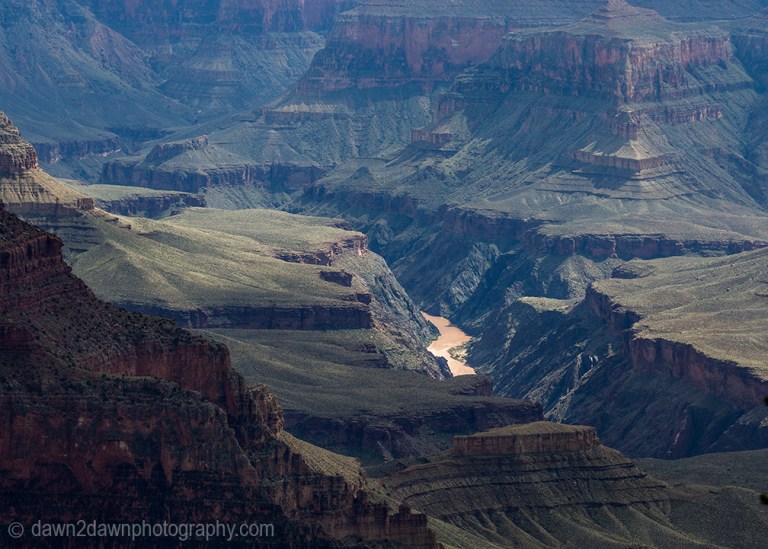 The Colorado River winds through the Grand Canyon as seen from Point Sublime.