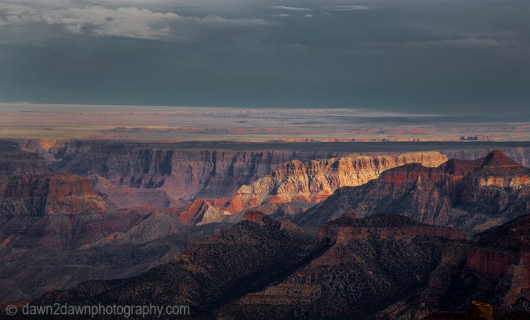 The settting sun forms shadows on the Grand Canyon at Point Imperial
