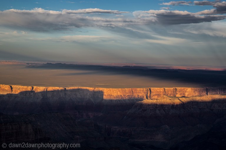 The settting sun forms shadows on the Grand Canyon at Point Imperial