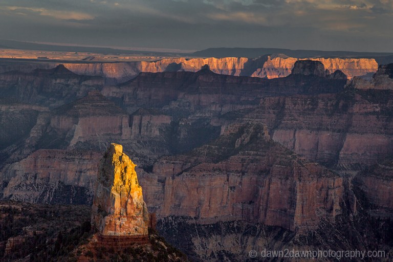 The settting sun forms shadows on the Grand Canyon at Point Imperial
