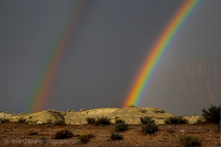 A passing storm produces a rainbow at Zion National Park, Utah