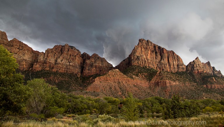 A storm approaches Zion National Park through The Watchman in Southern Utah