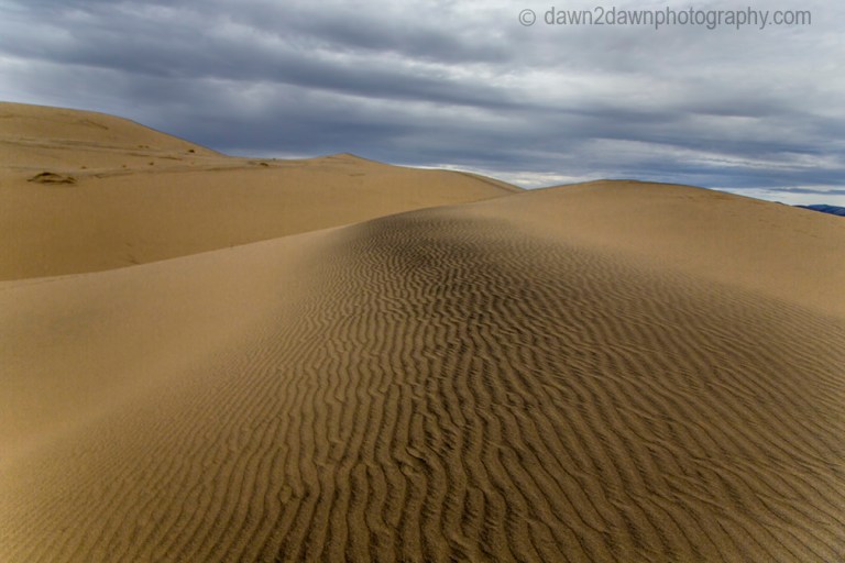 Shifting patterns and lines of sand at the Eureka Dunes at Death Valley National Park, California