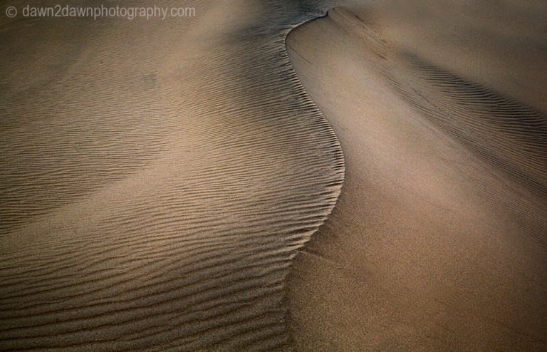 Shifting patterns and lines of sand at the Eureka Dunes at Death Valley National Park, California