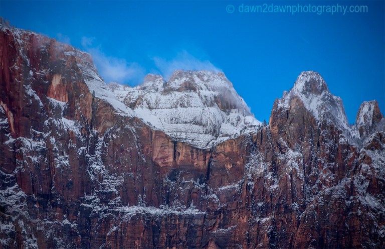 Fresh snow has fallen during autumn at Zion National Park's Towers Of The Virgin