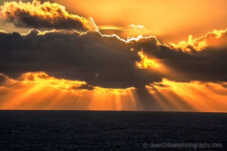 The sun sets over the Pacific Ocean near Big Sur, California