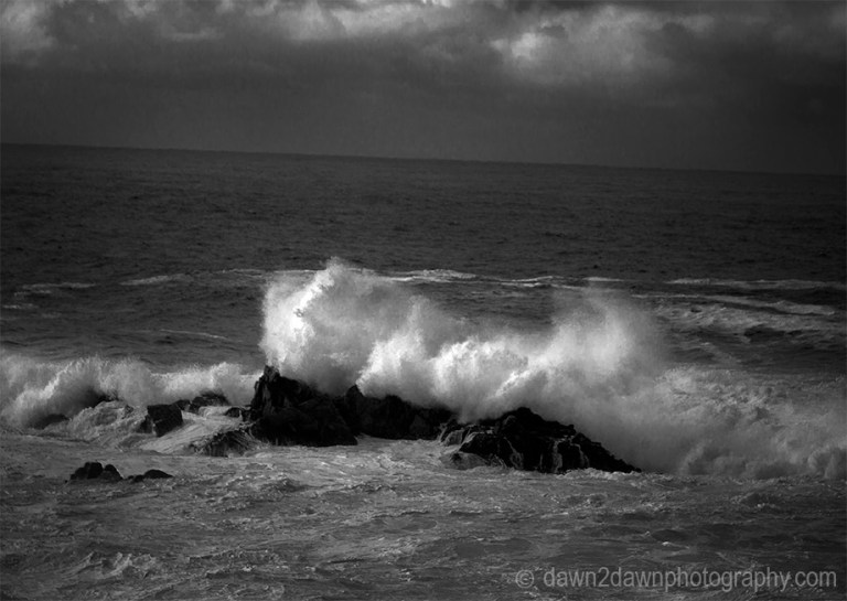 A passing storm produces high surf along California's Pacific Ocean Coastline near Big Sur