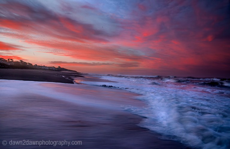 The sun rises over the Pacific Ocean at Cambria, California