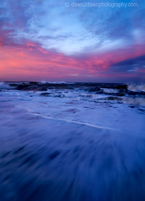 The sun rises over the Pacific Ocean at Cambria, California
