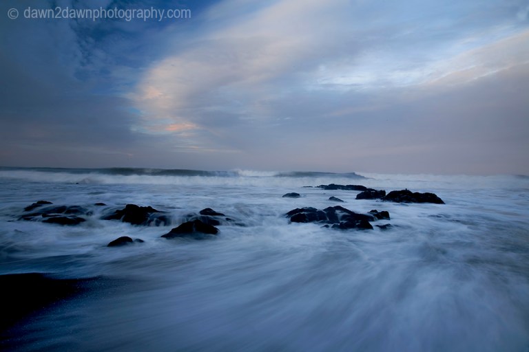 The sun rises over the Pacific Ocean at Cambria, California
