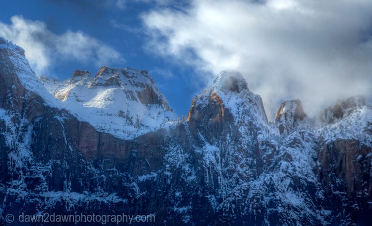 Fresh snow has fallen during winter at The Towers Of The Virgin at Zion National Park, Utah