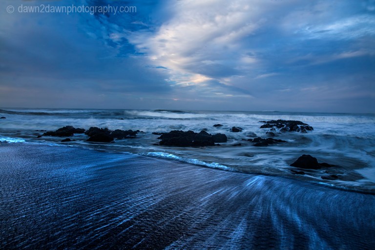 The sun rises over the Pacific Ocean at Cambria, California