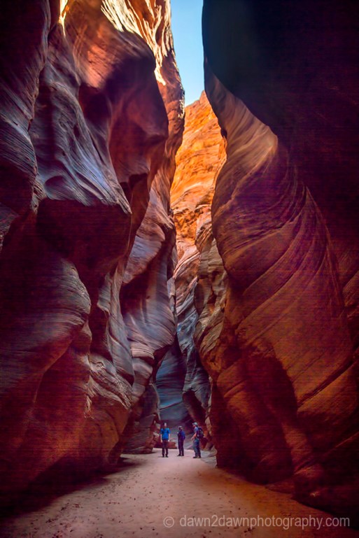 Hikers in Buckskin Gulch at Vermilion Cliffs National Monument, Utah