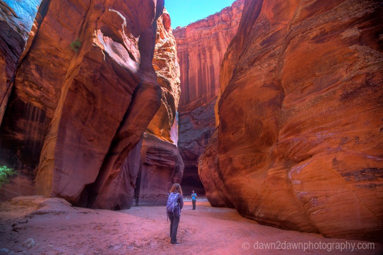 Hikers in Buckskin Gulch at Vermilion Cliffs National Monument, Utah