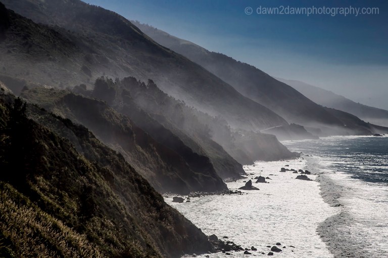 Fog rolls into the highlands along California's Pacific Ocean Coast at Big Sur.