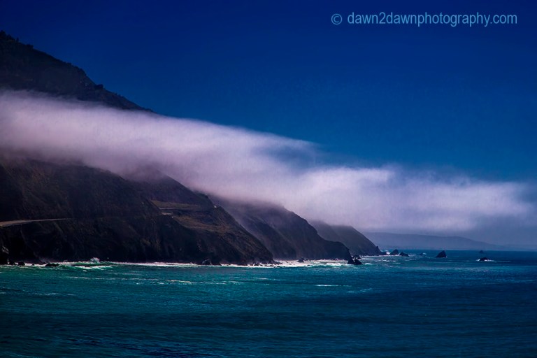 Fog rolls into the California Coast near Big Sur.