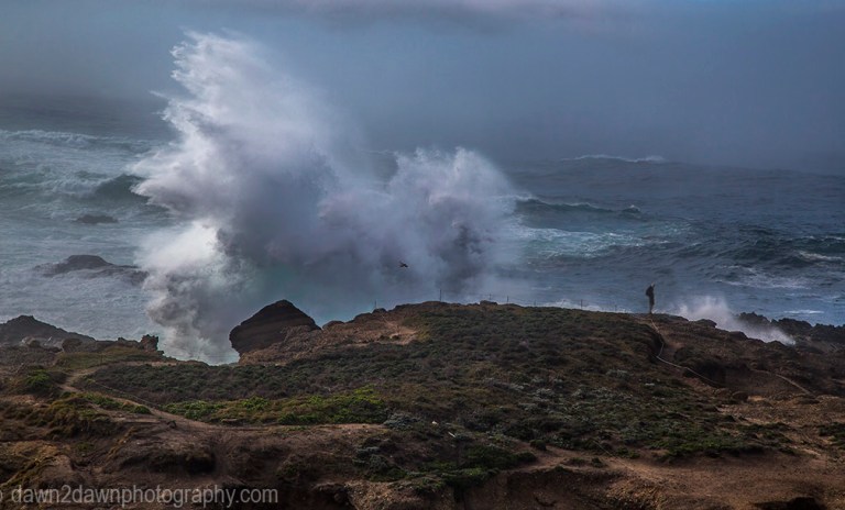 High surf produces big waves crashing upon the shoreline at Point Lobos State Natural Reserve at Carmel, California