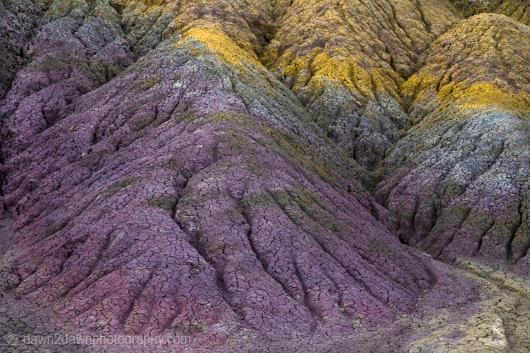 The colorful sedimentary layer of clay is uncovered at Vermillon Cliffs National Monument, Arizona