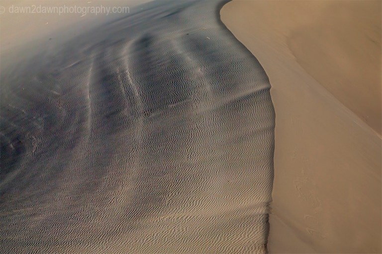 Patterns and ripples produced by erosion are the dominant features of Eureka Dunes at Death Valley National Park, California