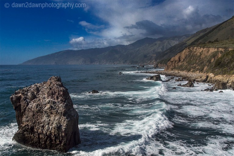 Waves pound upon the shoreline along California's Pacific Ocean Coastline near Big Sur.