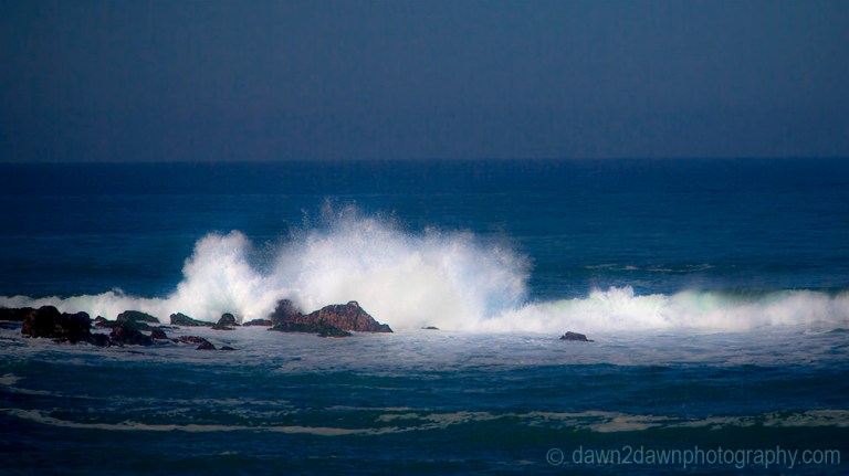 Waves pound upon the shoreline along California's Pacific Ocean Coastline near Big Sur.