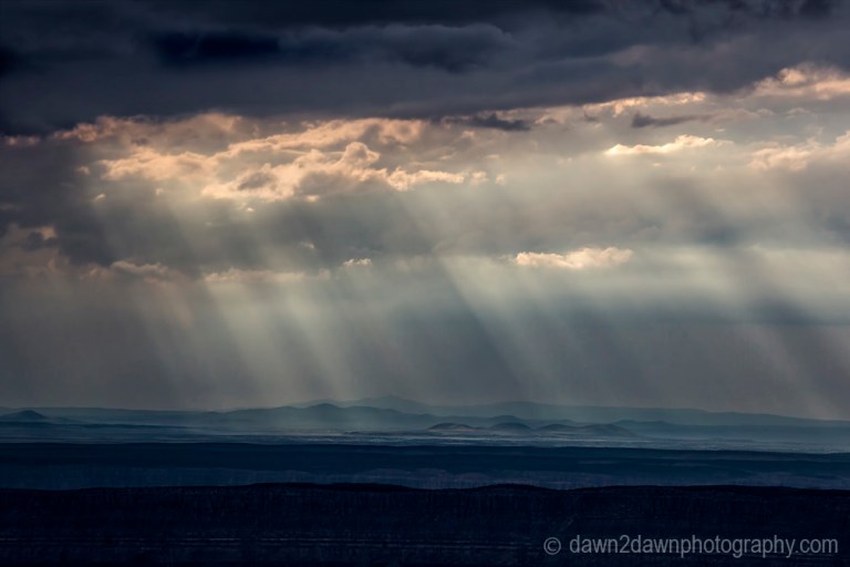 Storm clouds pass over the Grand Canyon near Timp Point, Kaibab National Forest, Arizona
