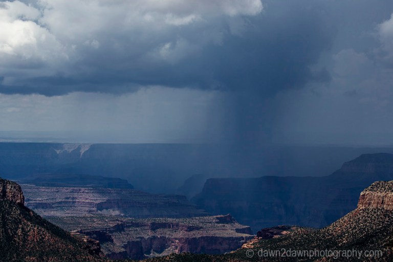 Storm clouds pass over the Grand Canyon as seen from Timp Point, Kaibab National Forest, Arizona
