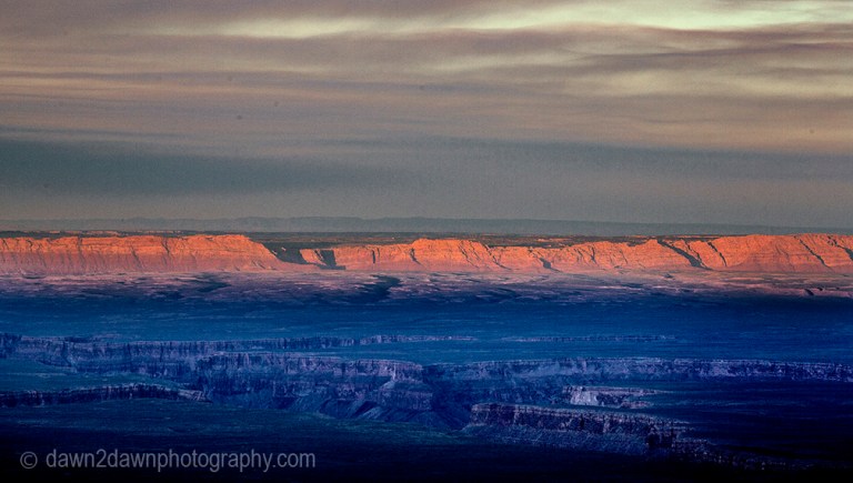 The light from the setting sun shines on Marble Canyon at Grand Canyon National Park, Arizona.