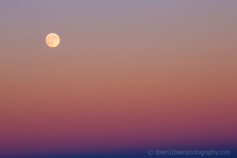 A full moon rises over Marble Canyon at Grand Canyon National Park, Arizona.