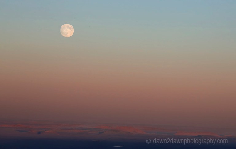 A full moon rises over Marble Canyon at Grand Canyon National Park, Arizona.