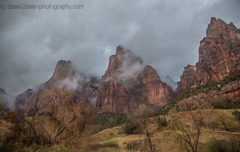 A passing rain storm produces thick clouds and fog at Zion National Park, Utah