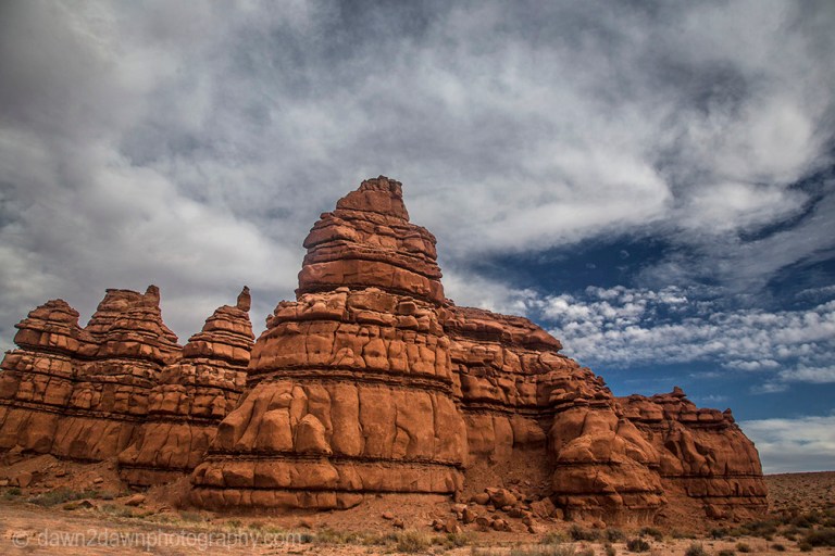 Unusual sandstone rock formations are seen along Utah's rural Highway 24.