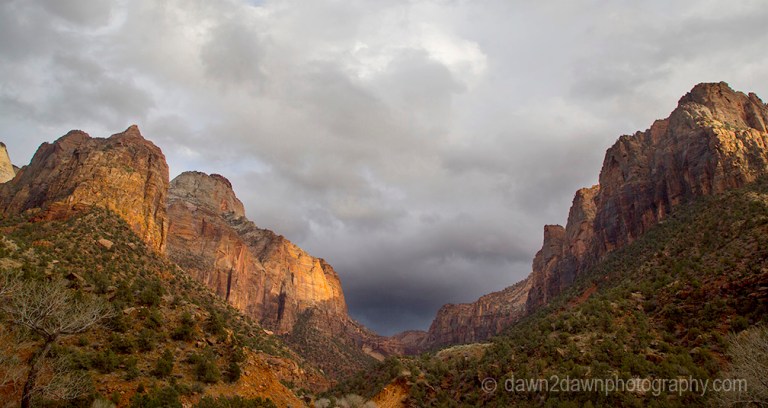 A passing rain storm produces thick clouds and fog at Zion National Park, Utah