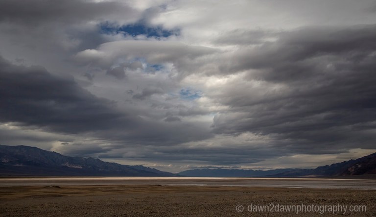 Unusual rainstorms pass through Badwater Basin at Death Valley National Park, California
