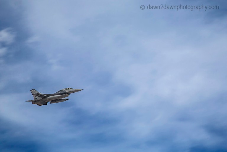 A fighter jet from nearby China Lake Naval Air Warfare Center flies over Death Valley National Park, California