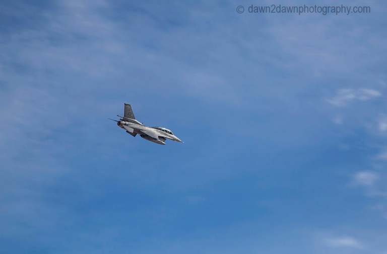 A fighter jet from nearby China Lake Naval Air Warfare Center flies over Death Valley National Park, California